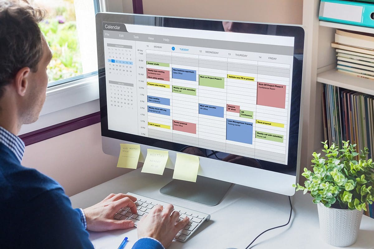 A computer user schedules Outlook appointments using integration with SuccessFactors.